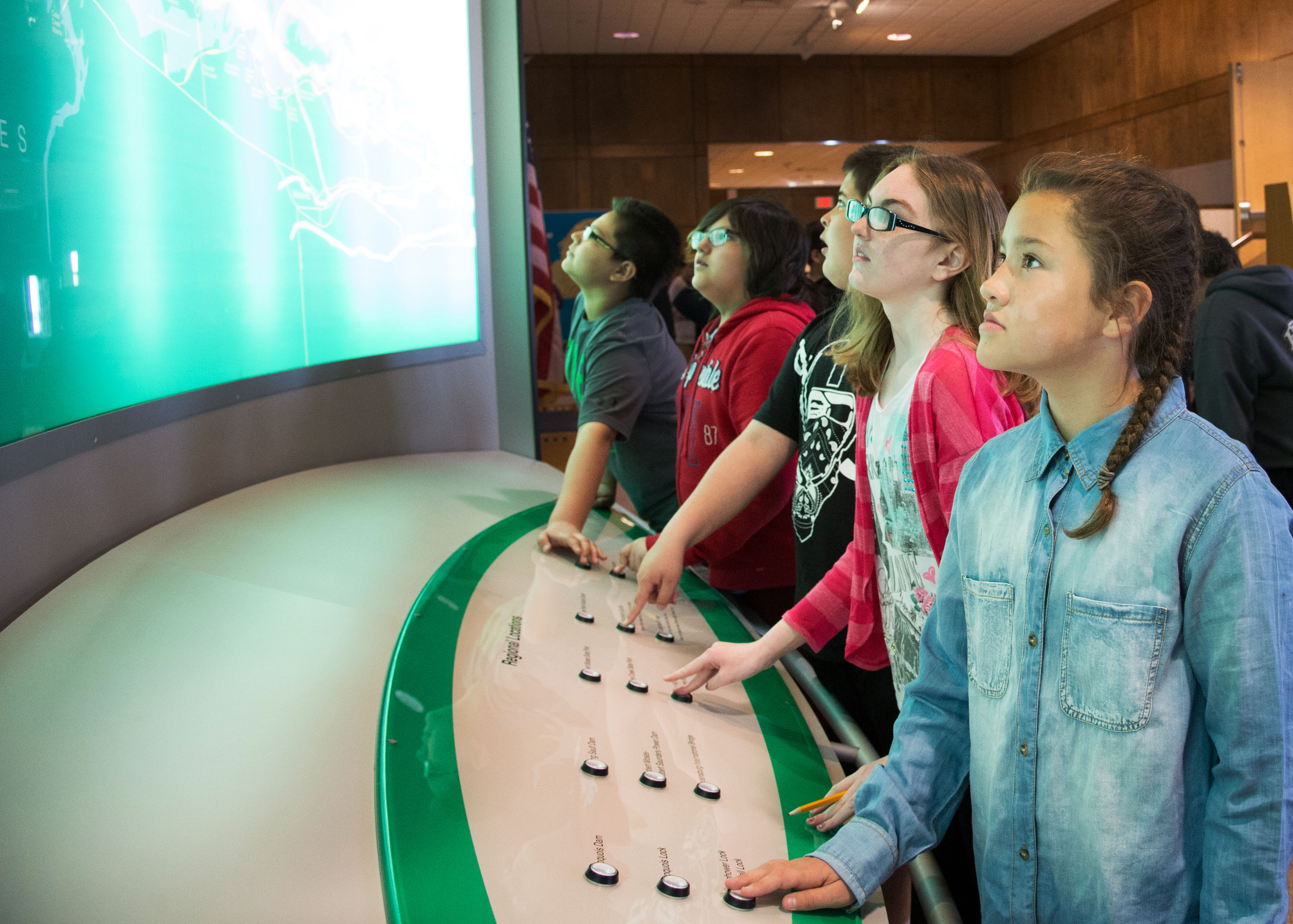 Students at the light-up terrain Map
